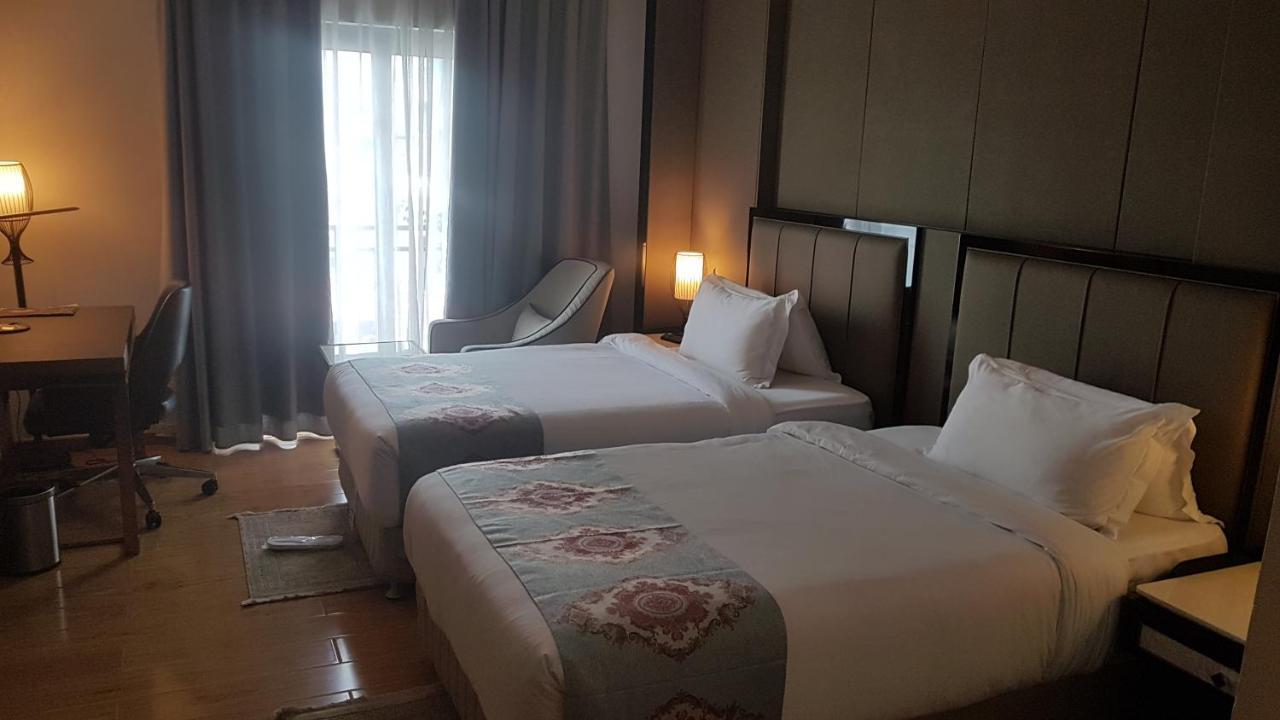 Check Inn Hotel Аддис-Абеба Экстерьер фото